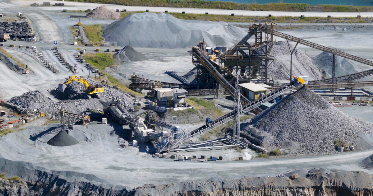 aerial-view-industrial-quarry-operations-with-excavator-conveyor-belts